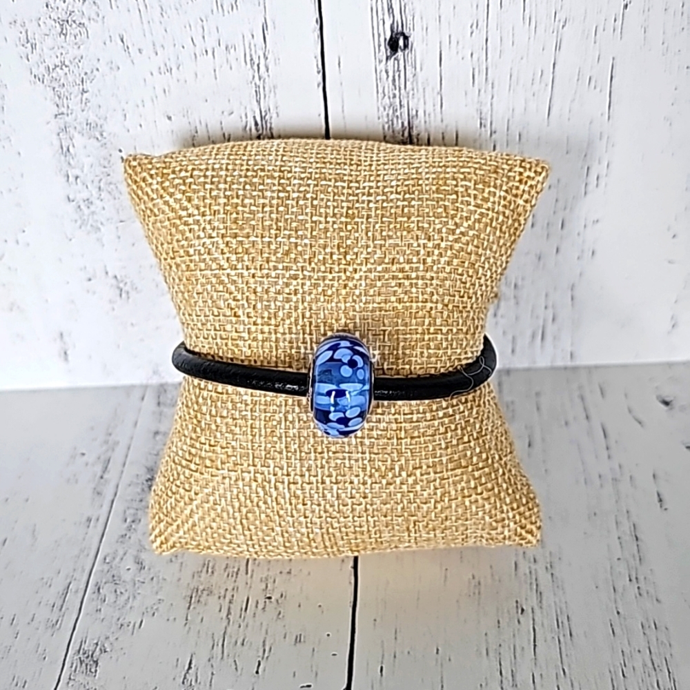 PANDORA LEATHER BRACELET WITH BLUE BEAD.